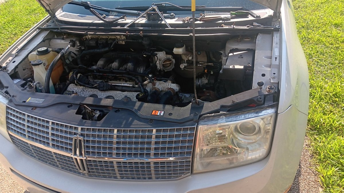 Automotive engine bay under repair