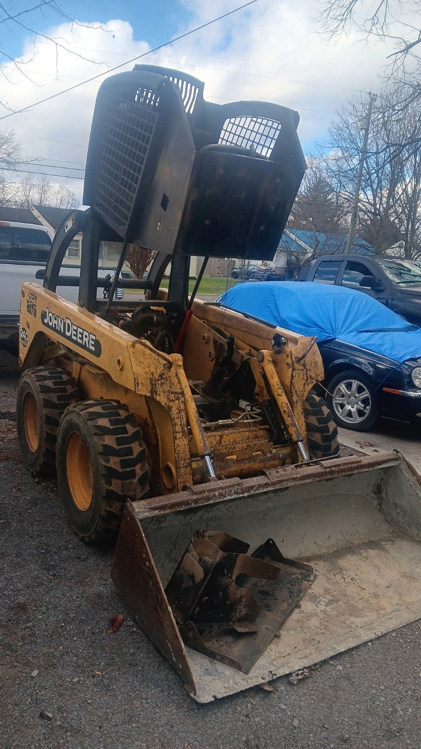 John Deere skid steer under repair